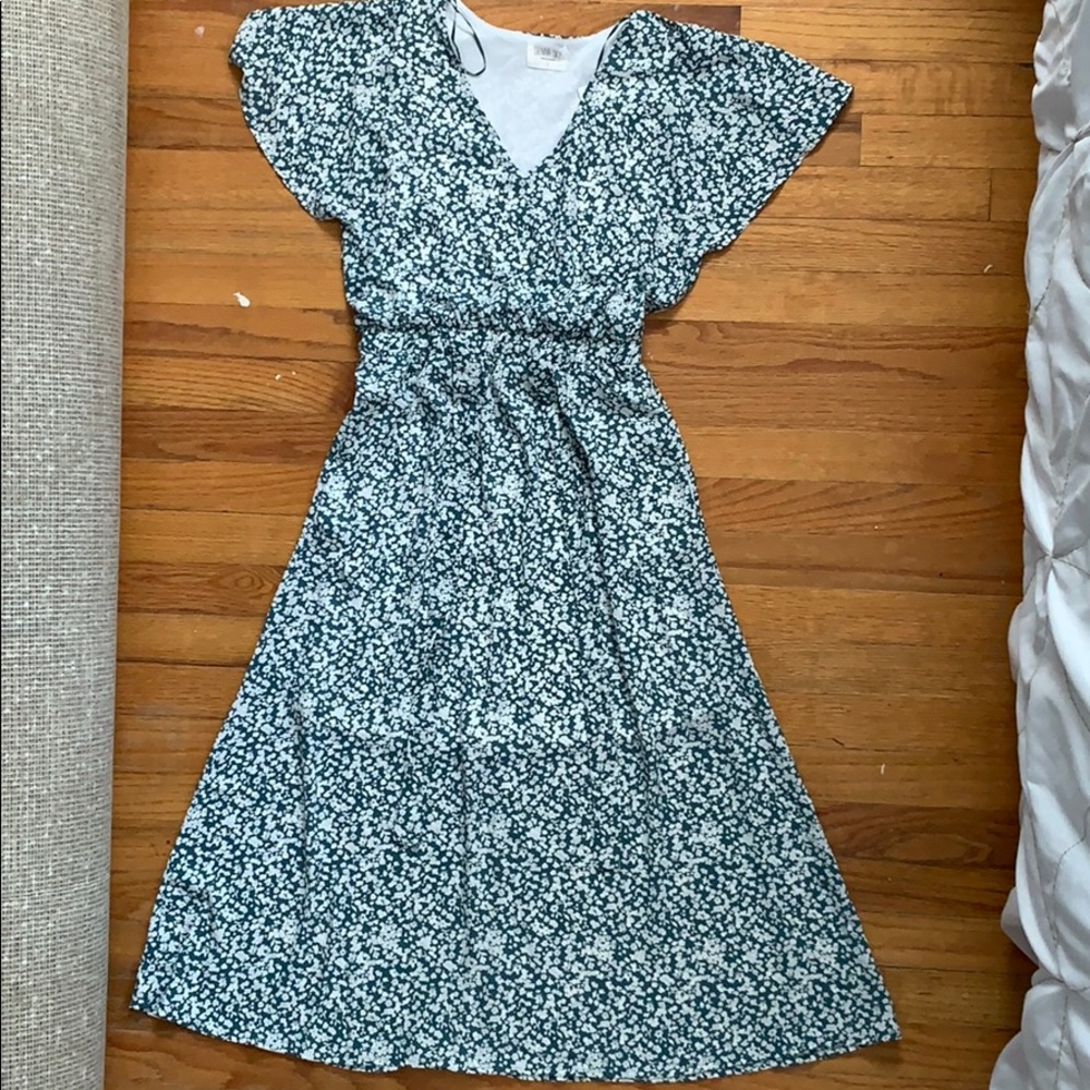 BRAND NEW floral maxi dress with flutter sleeves.
